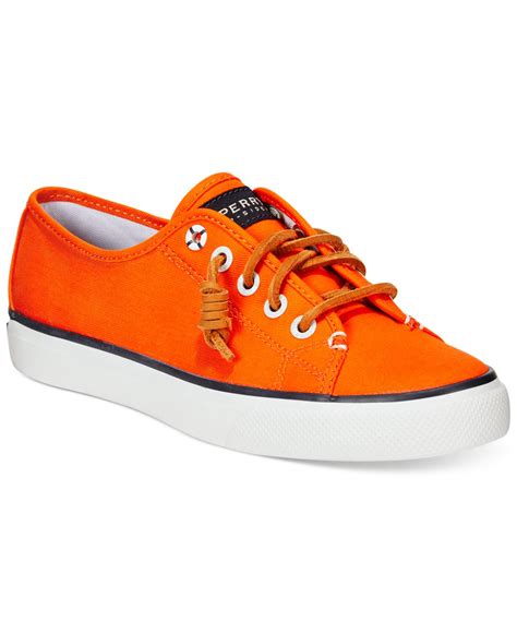 orange canvas sneakers for women.